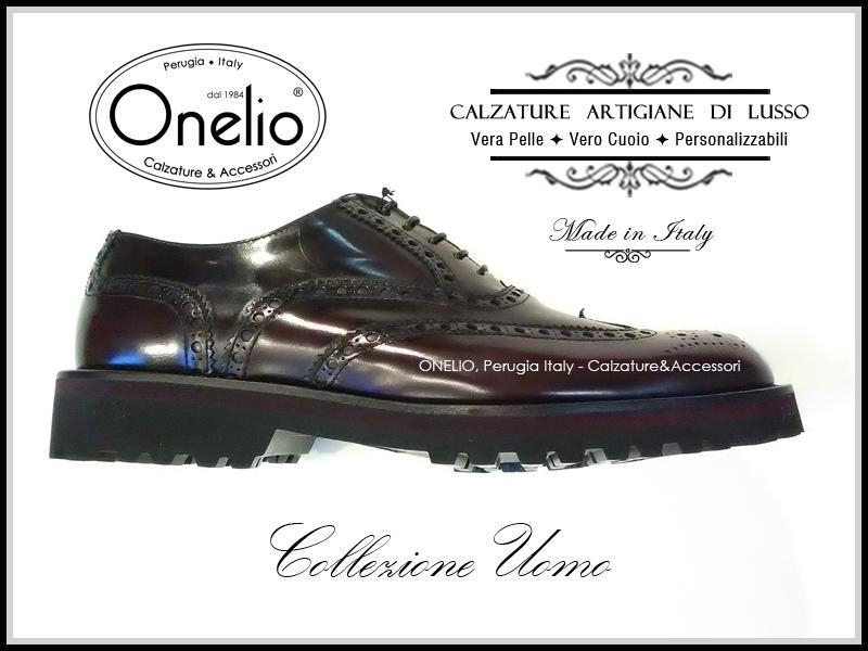 Stringata Oxford Brogue in abrasivato bordeaux