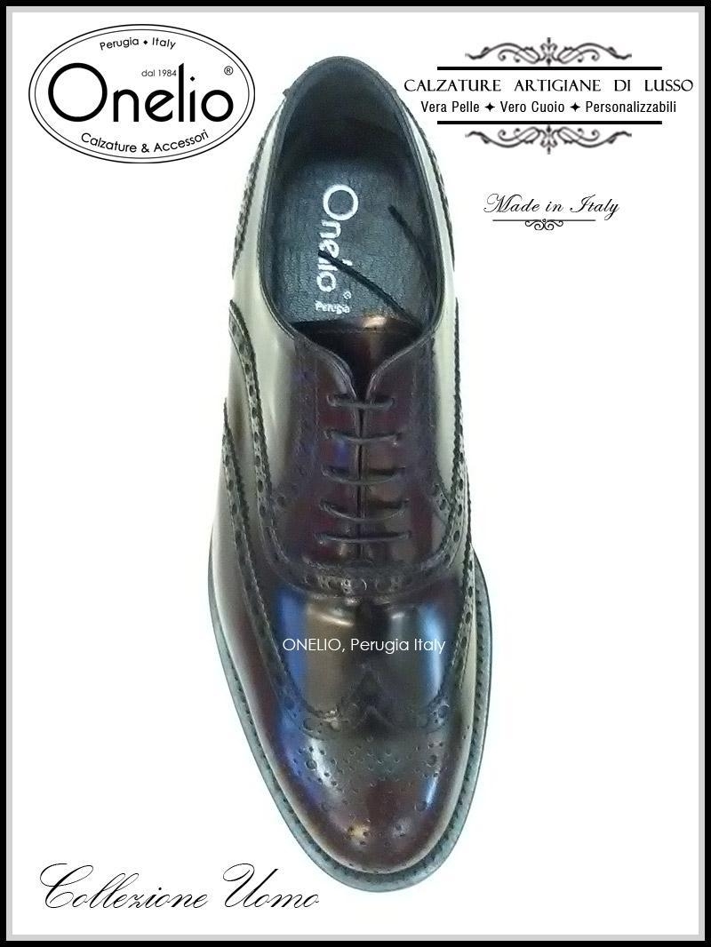 Stringata Oxford Brogue in abrasivato bordeaux